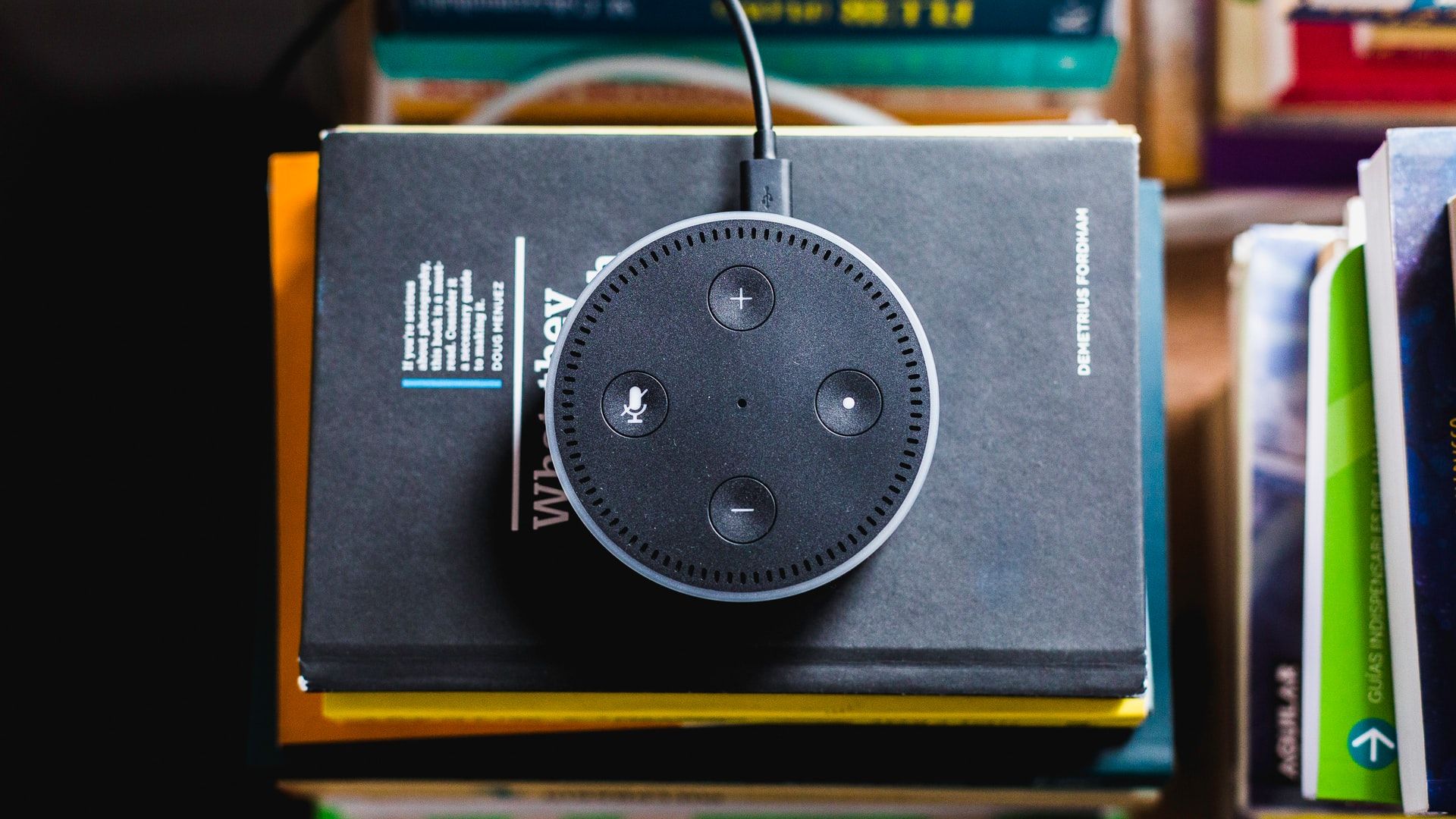 Amazon Echo on a pile of books