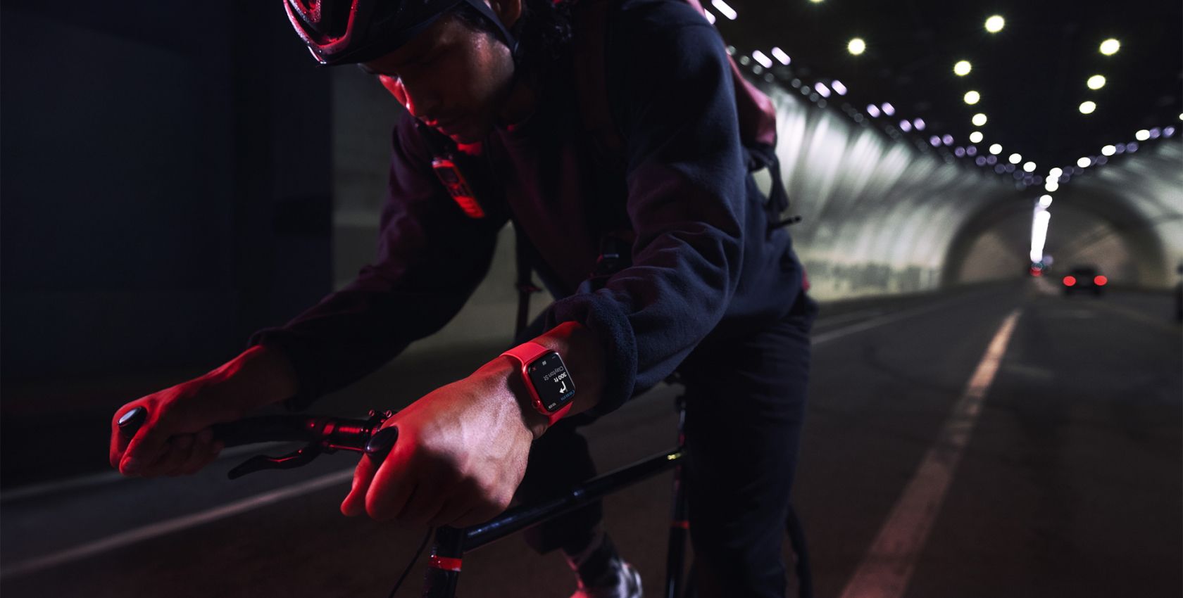 Cyclist wearing Apple Watch Series 7