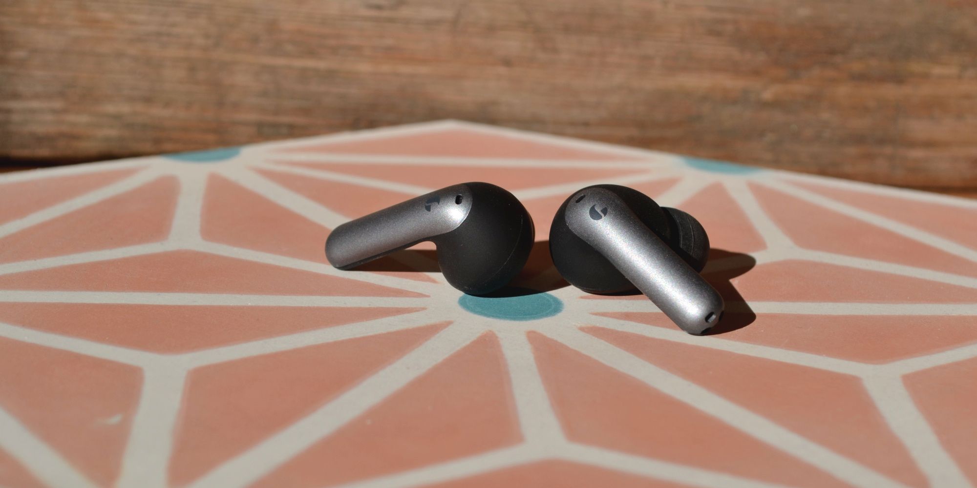 elevoc clear earbuds review buds on tile side
