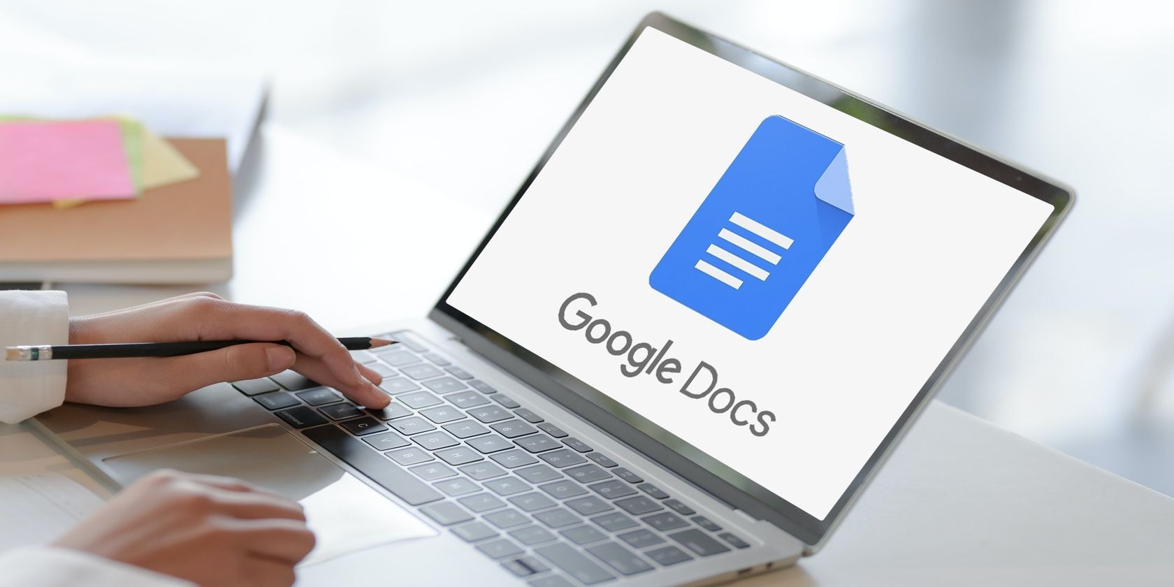 MacBook with Google Docs logo