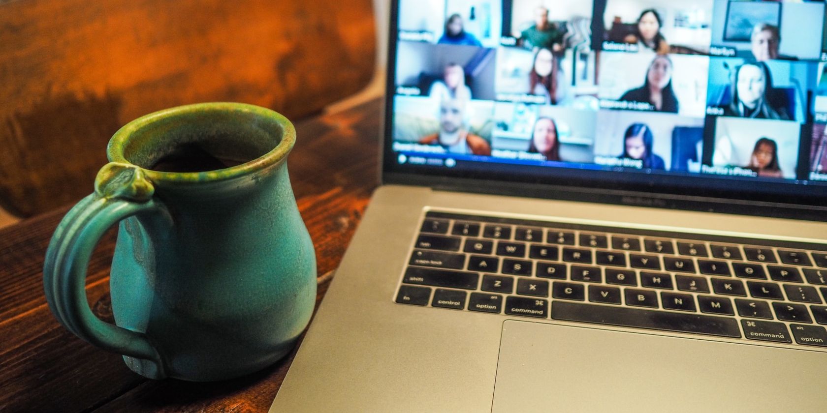 Mug Beside Video Conferencing Laptop
