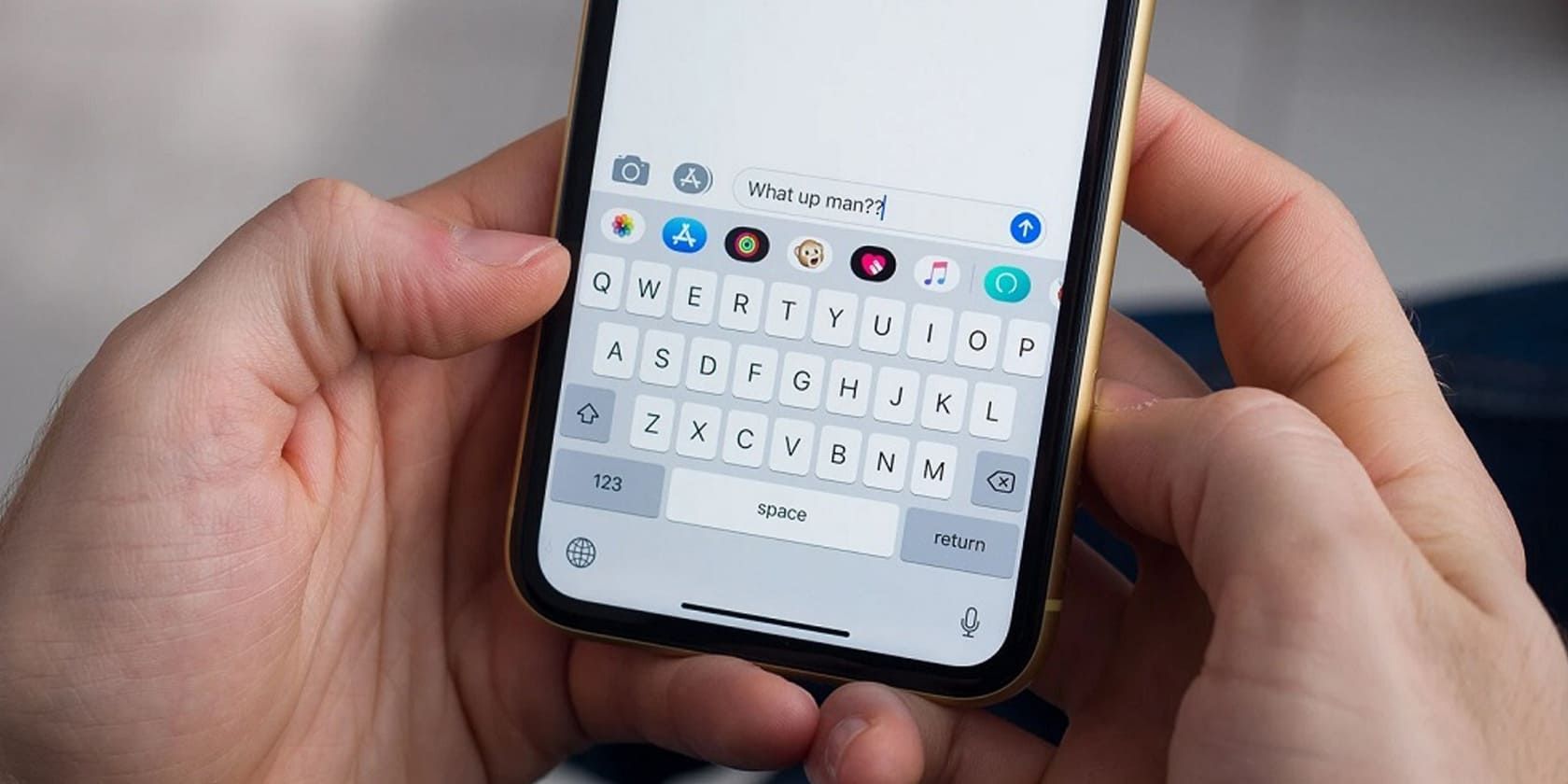 Photo of a person texting on the iPhone Messages app