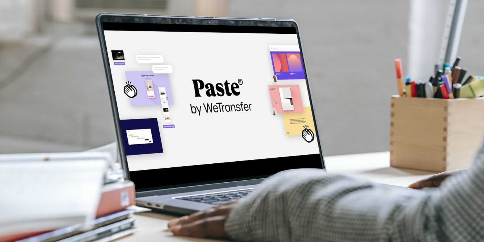 Paste by WeTransfer logo on laptop