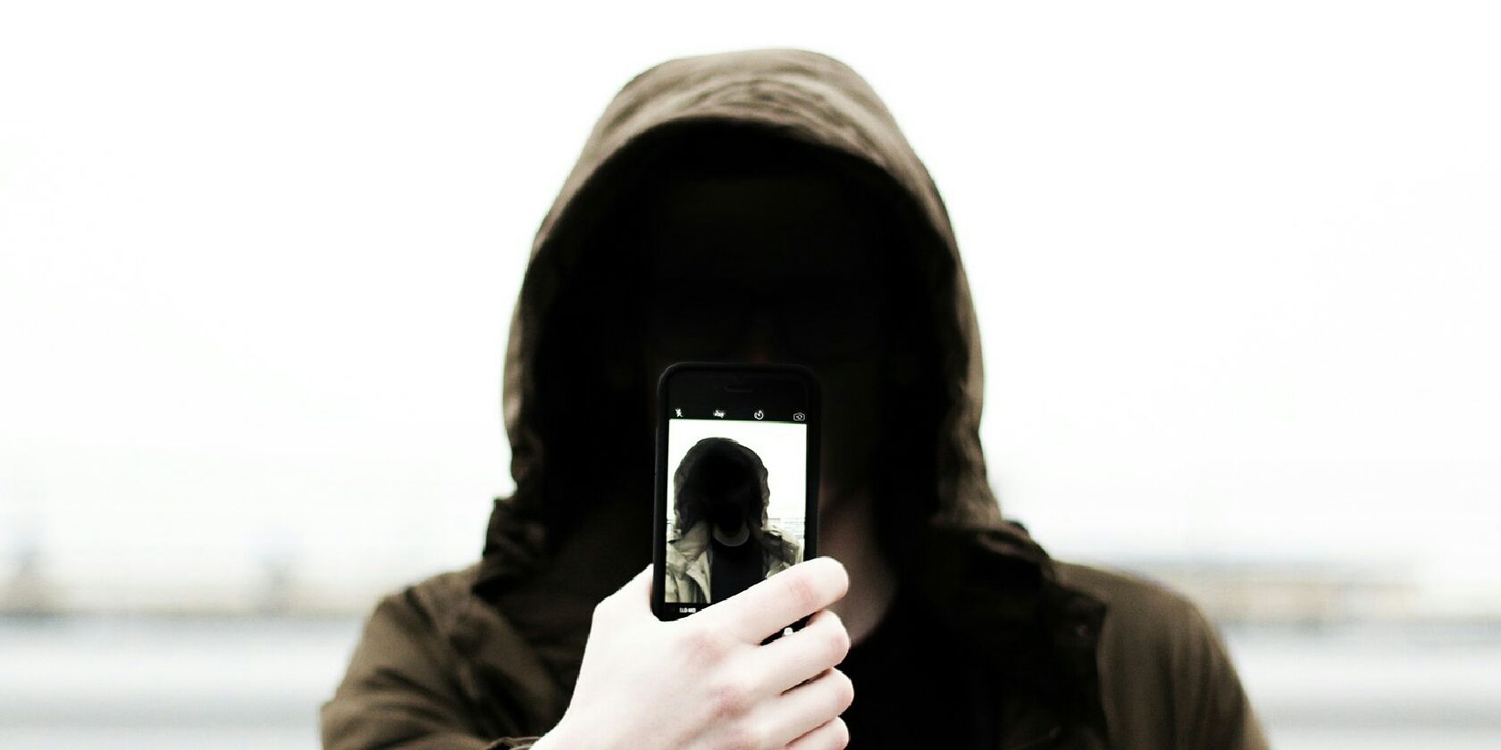photo of anonymous person taking a selfie