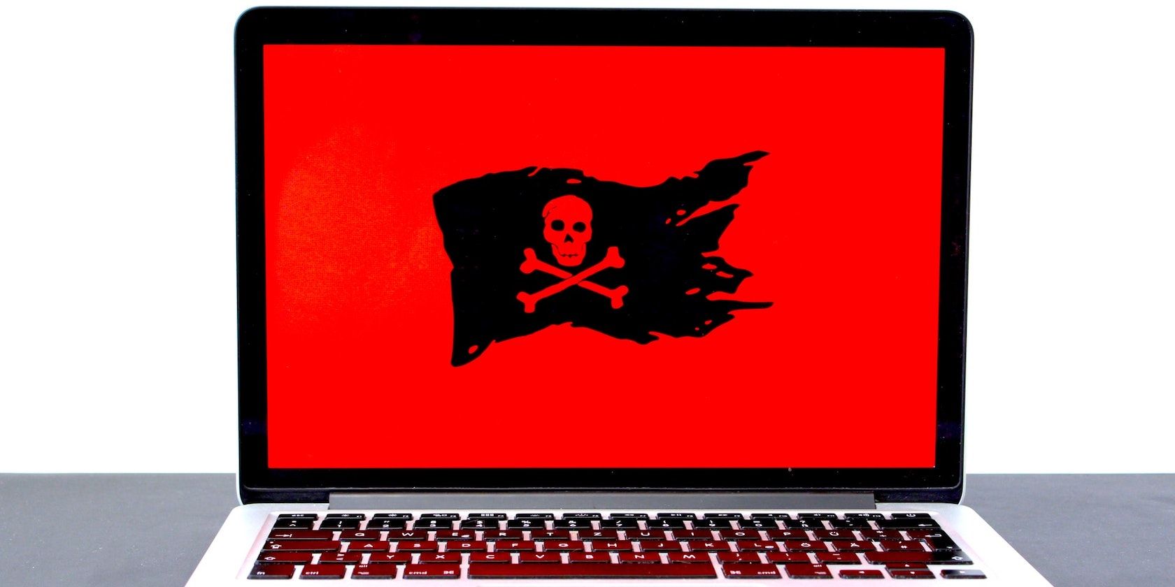 red pirate flag on mac laptop