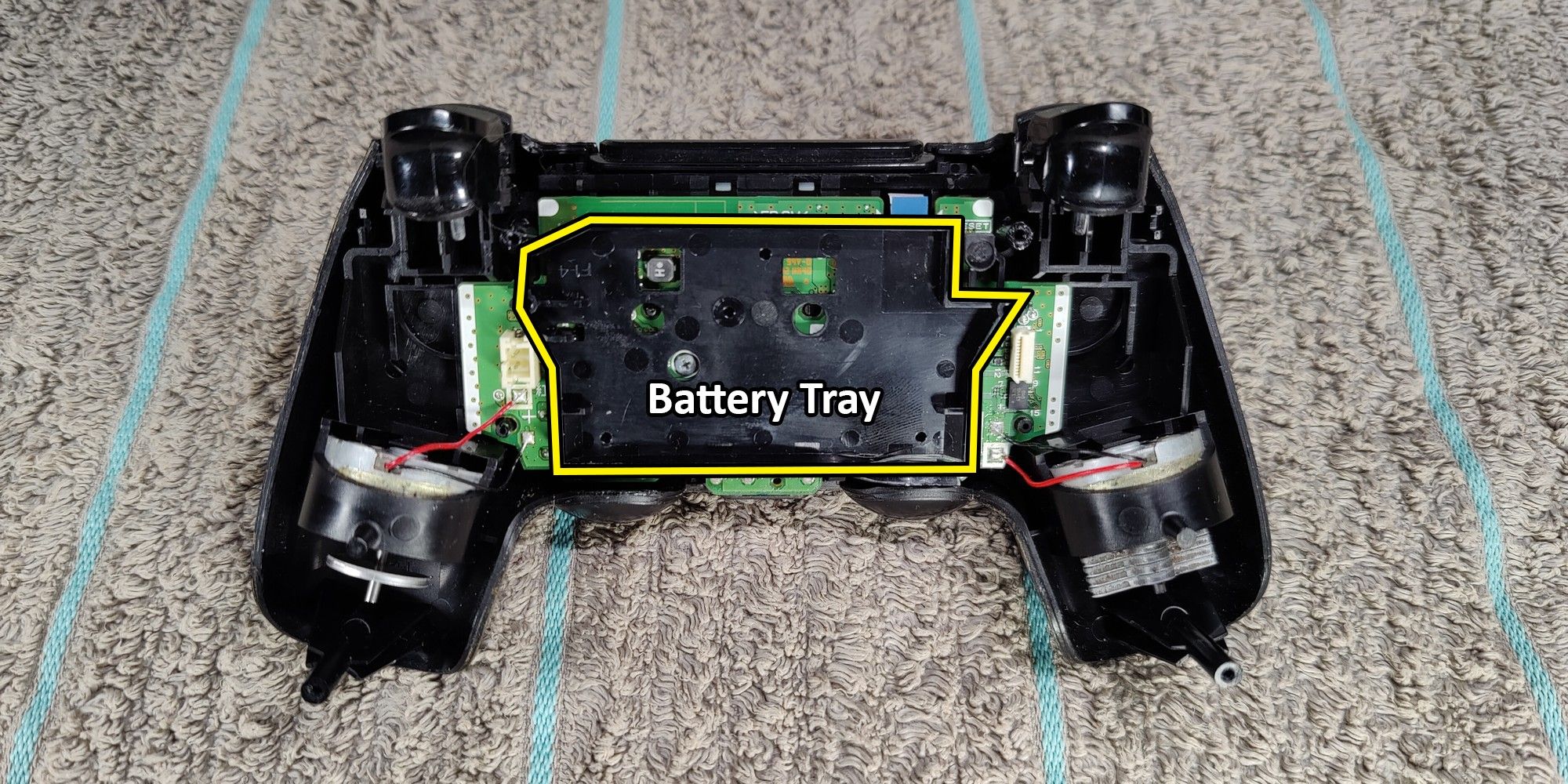 PS4 controller drift repair battery tray.