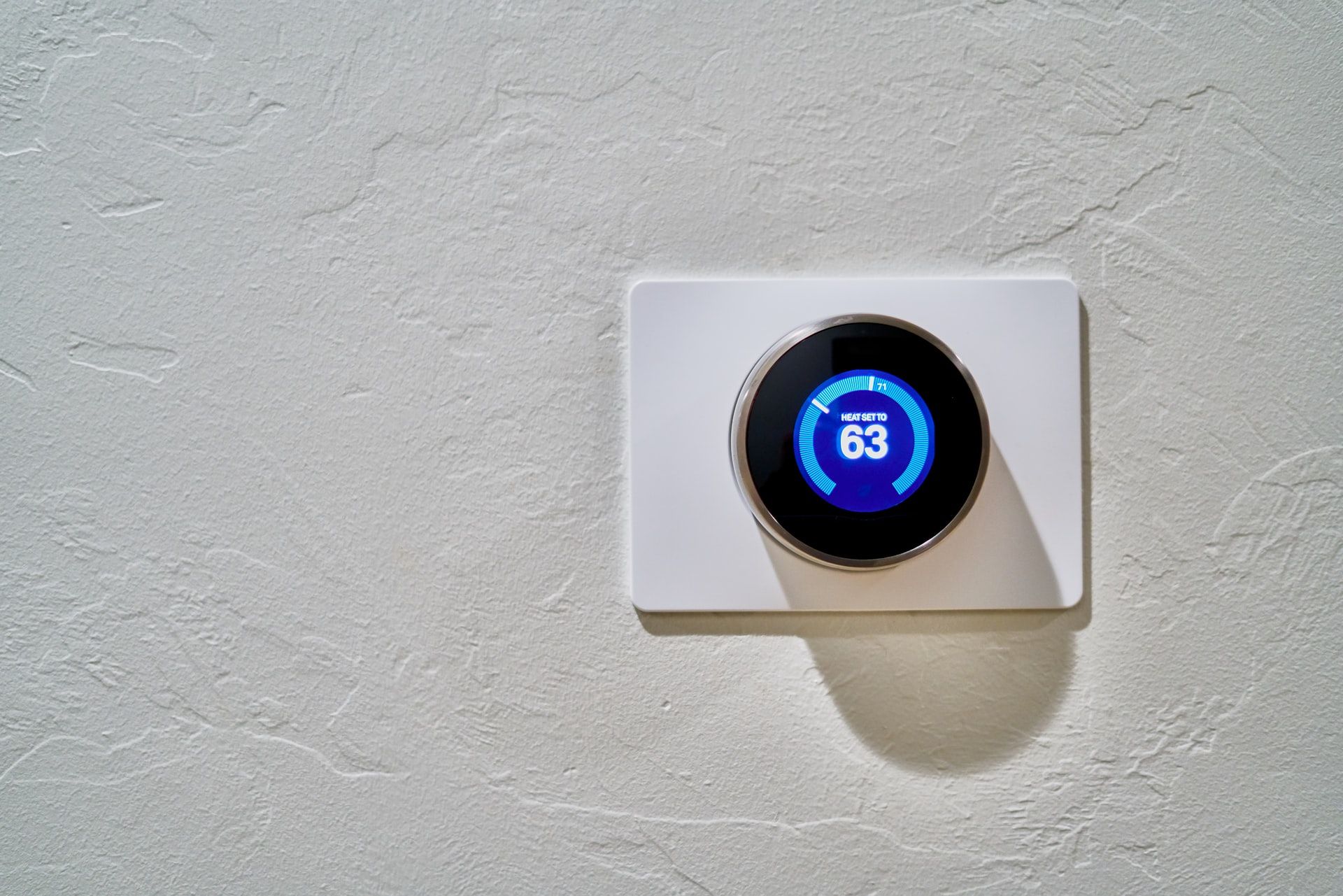 Photo of a thermostat on a wall