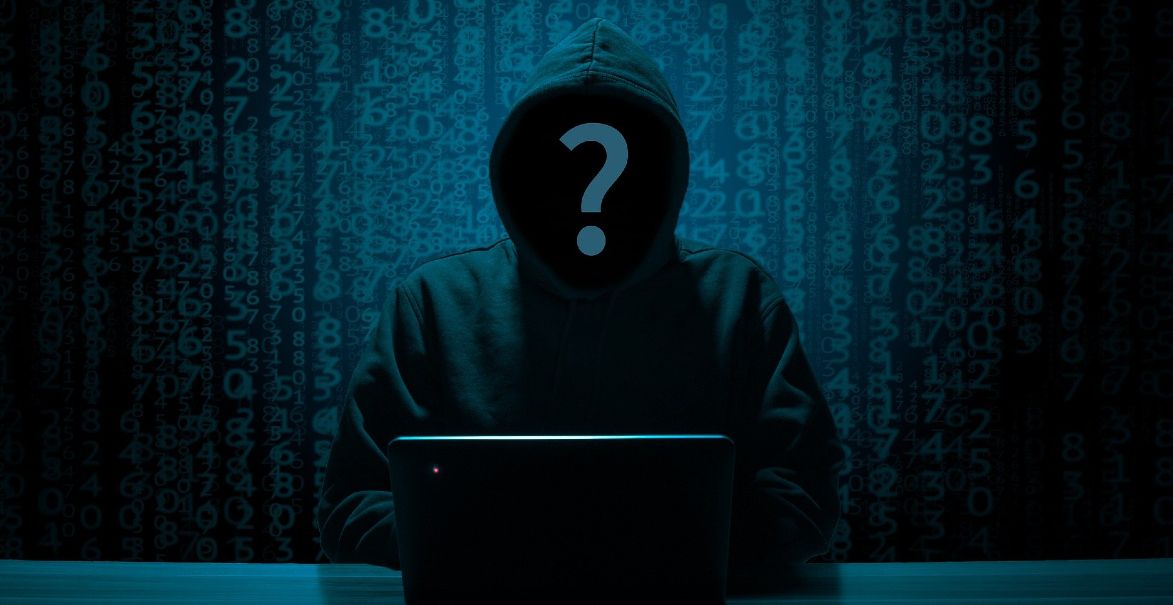 Dark silhouette of a hacker. 