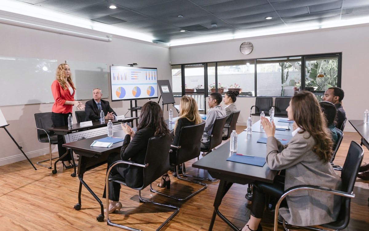 A group of people having a meeting