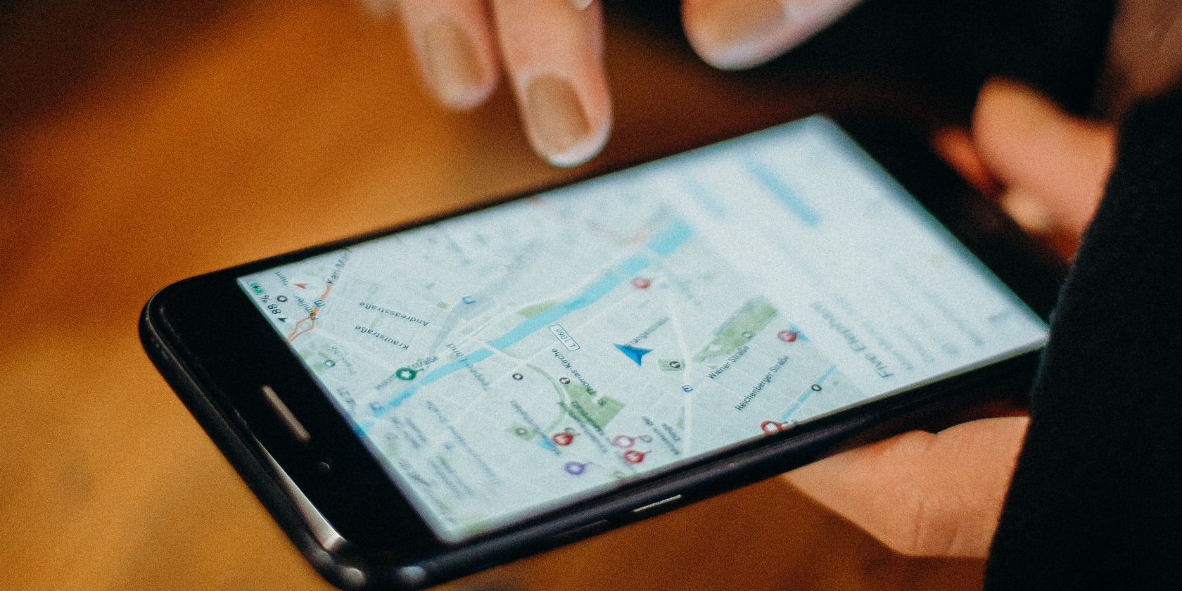 Person using a map on their iPhone