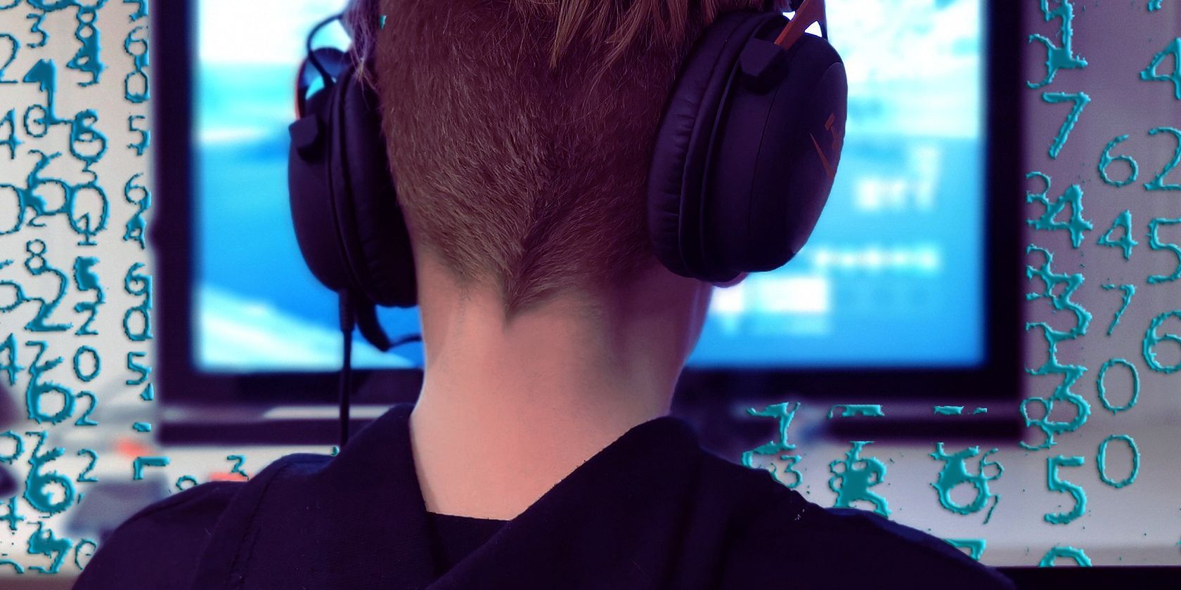 Gamers Playing on His Computer While Listening With Headphones