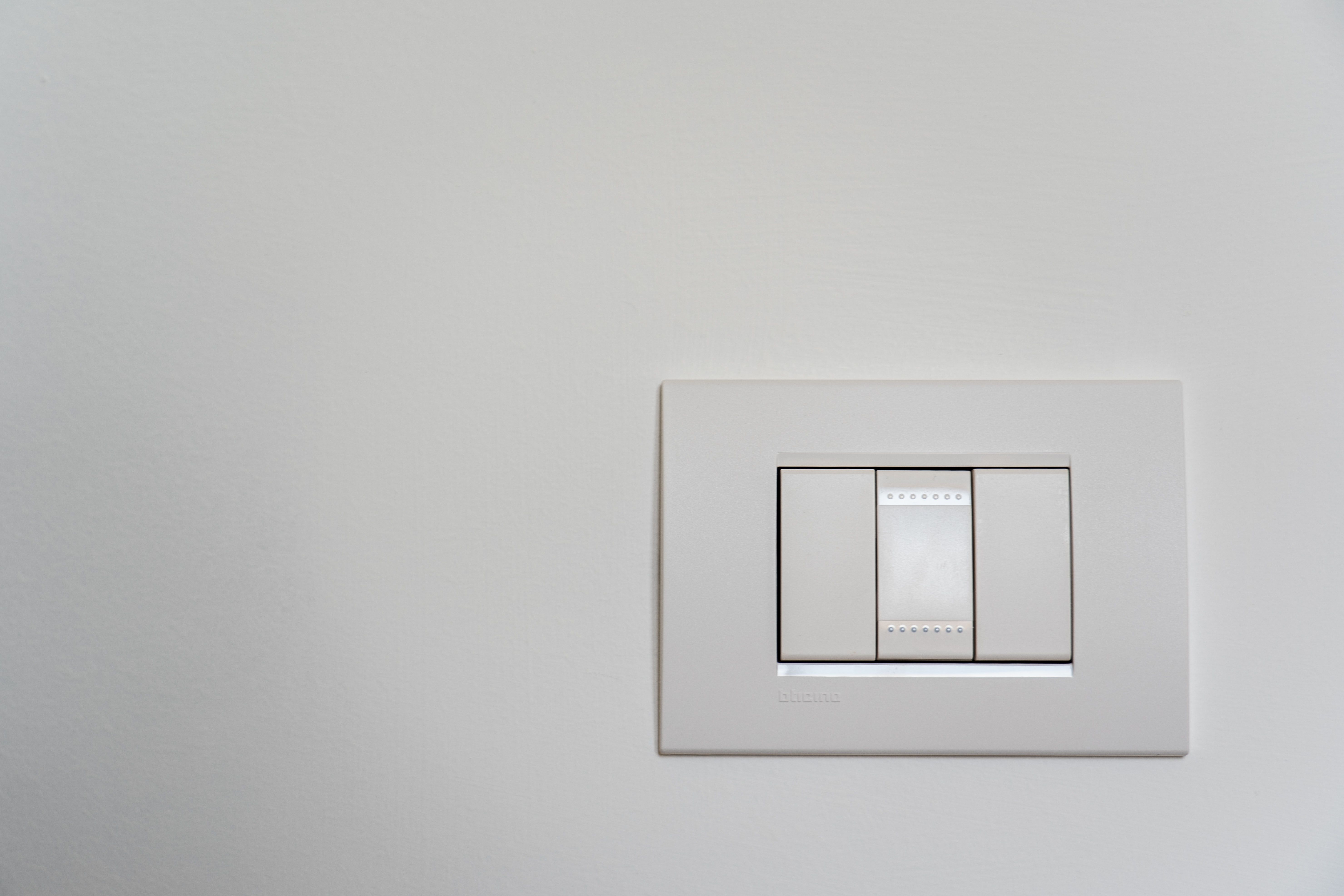 Photo of a light switch on a wall