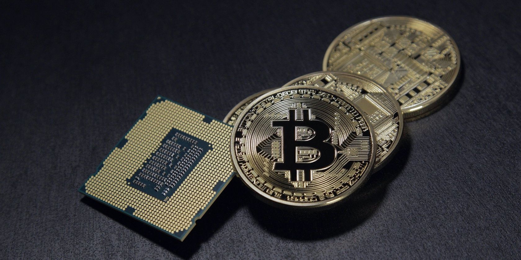 Image of crypto coins and a chip.