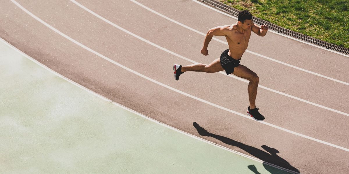 An image showing someone running on track
