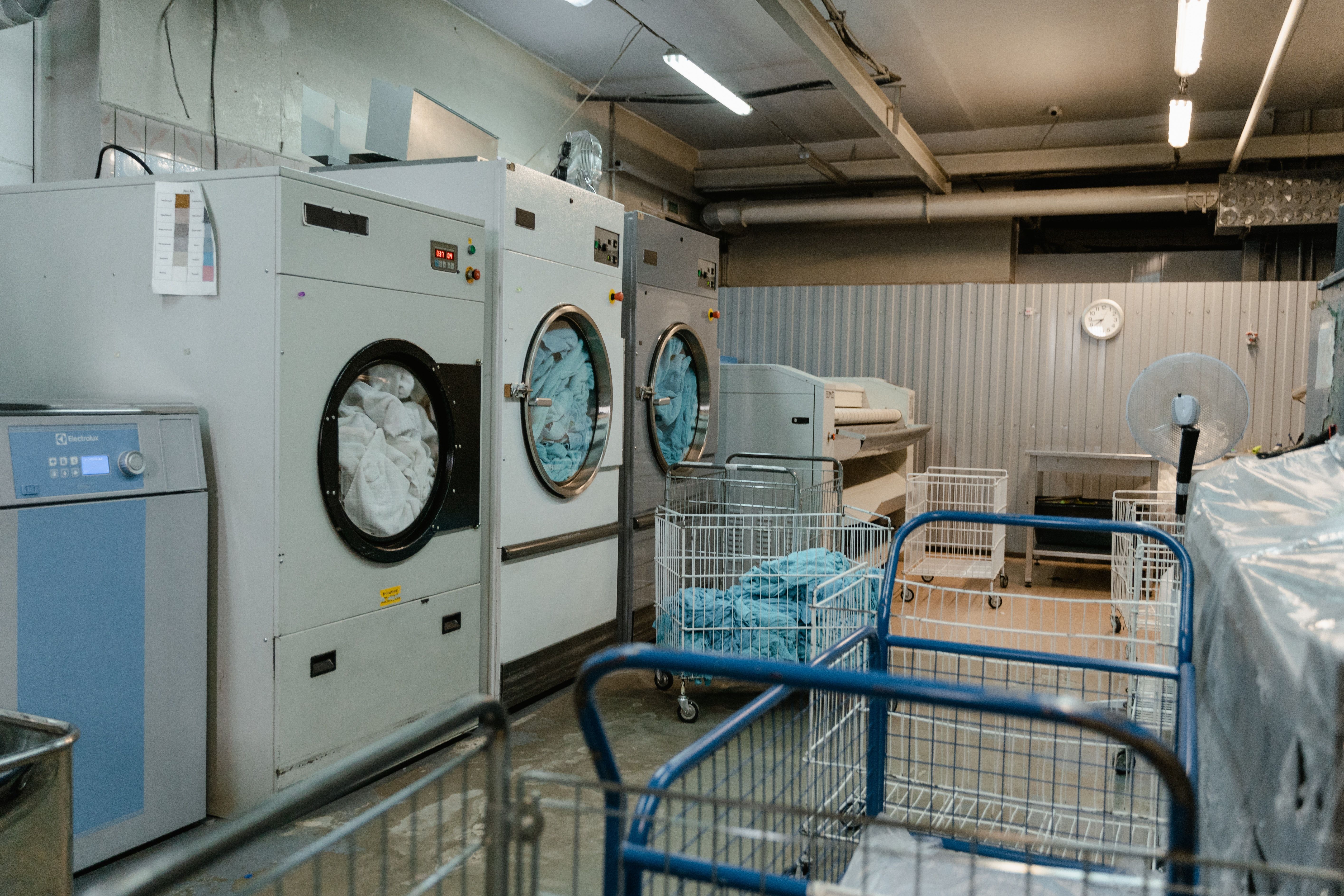 Photo of various washing machines in a room