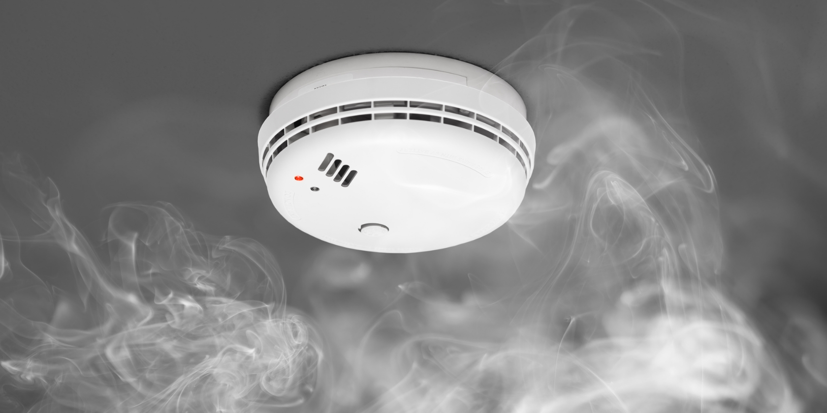 Smoke detector of fire alarm in action