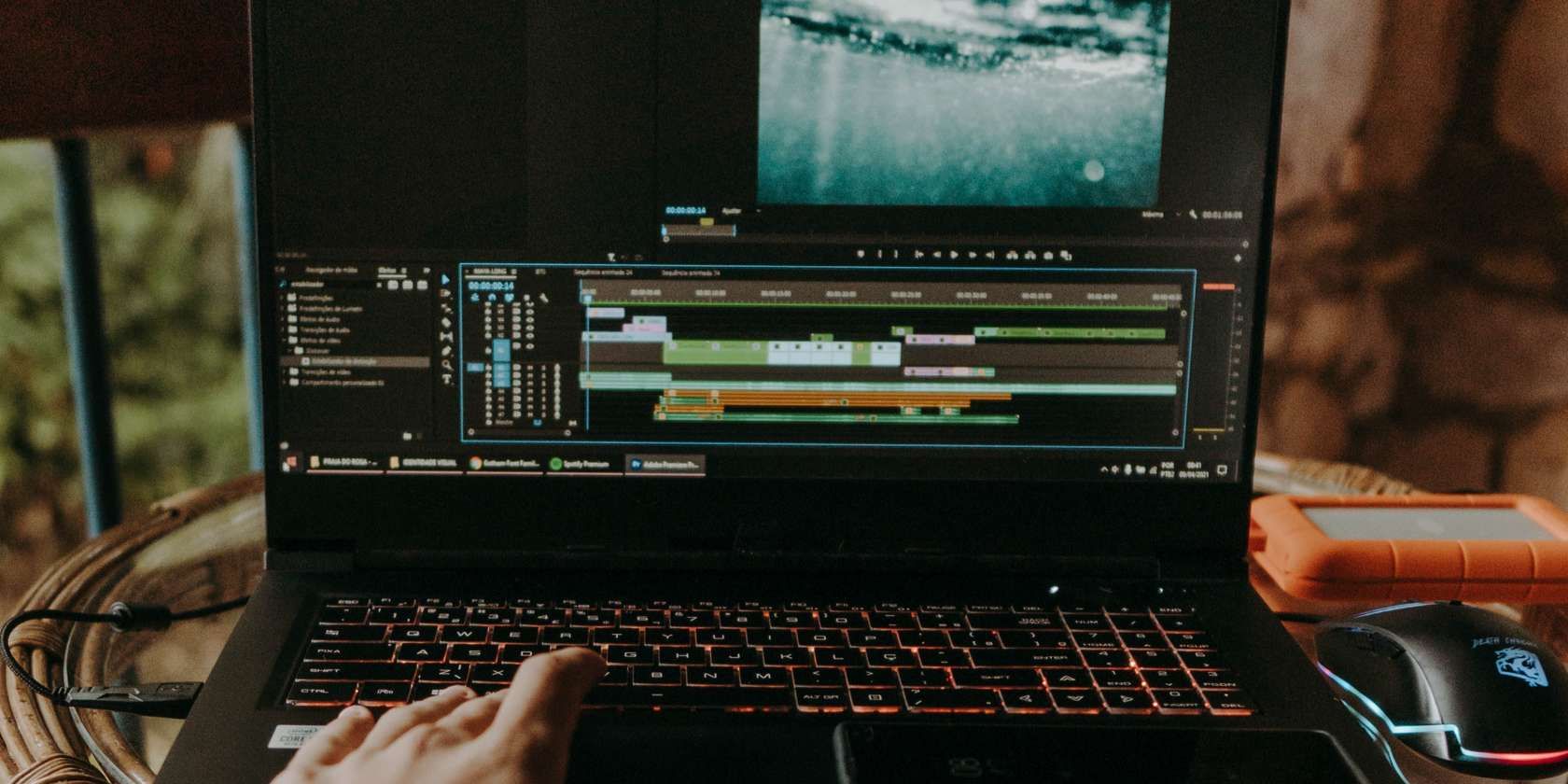 A person editing a project with Premiere Pro.
