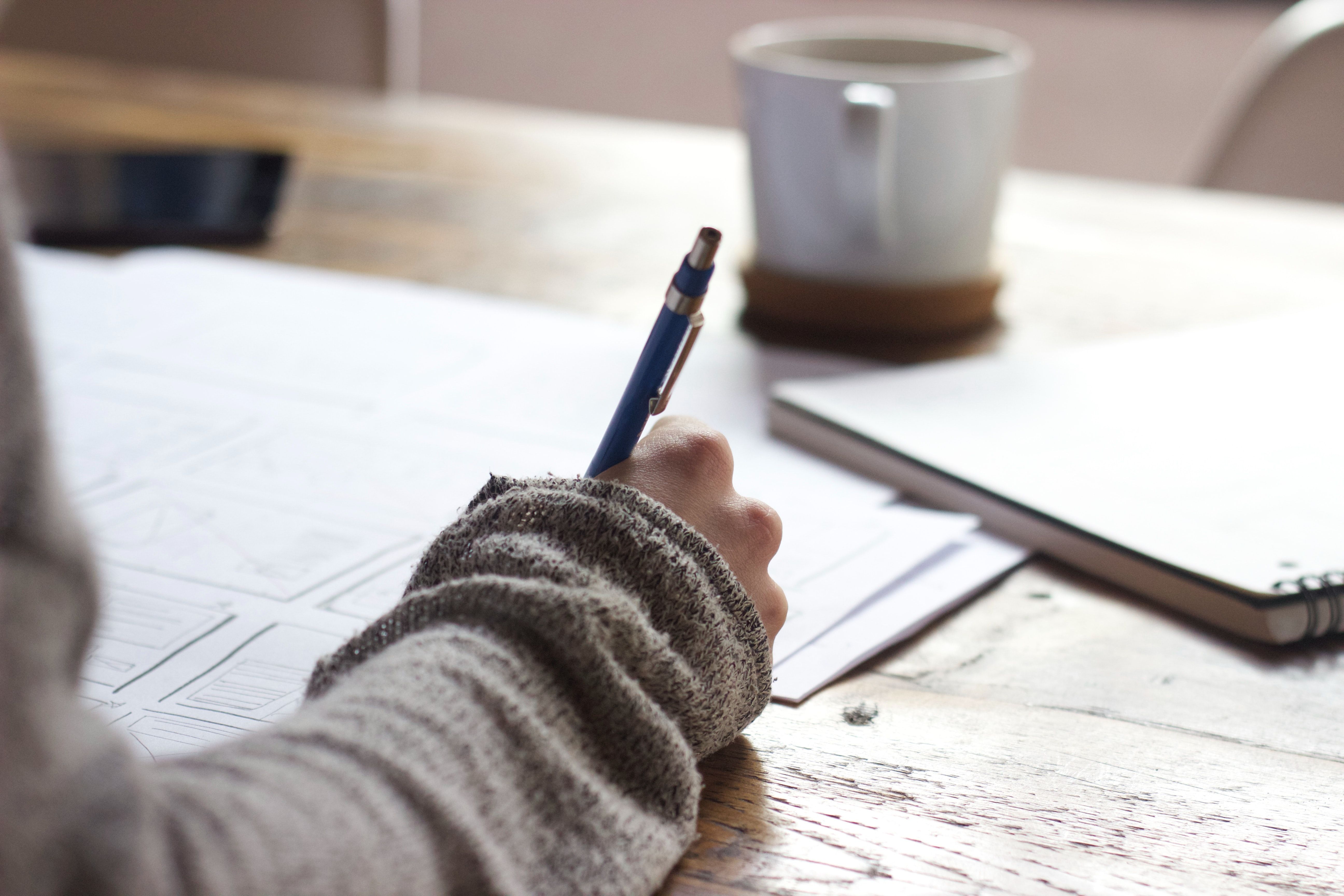 A woman using a journal template.