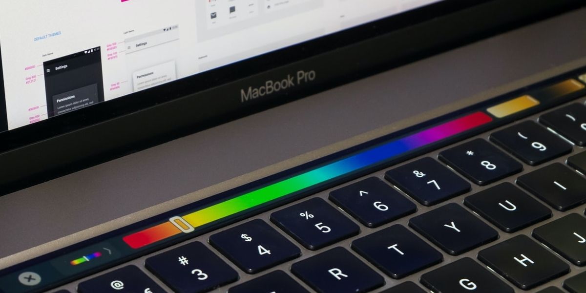 Macbook Touch Bar with color selection showing.