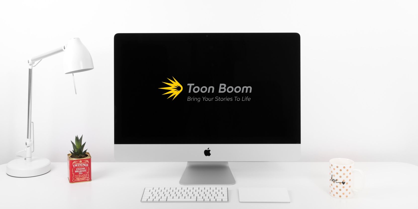 A computer with the Toon Boom logo on it.