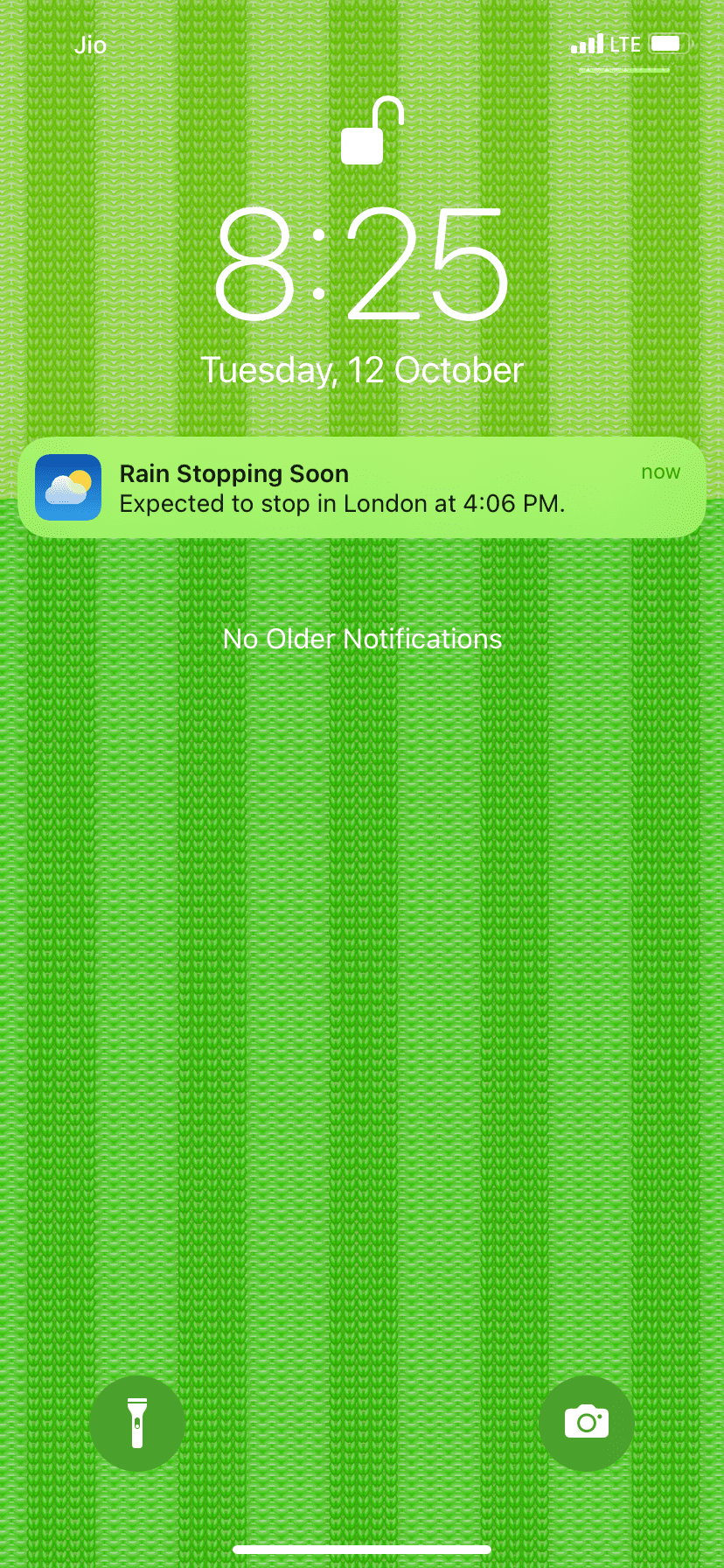 Weather app in iOS 15 showing notification for rain stopping soon