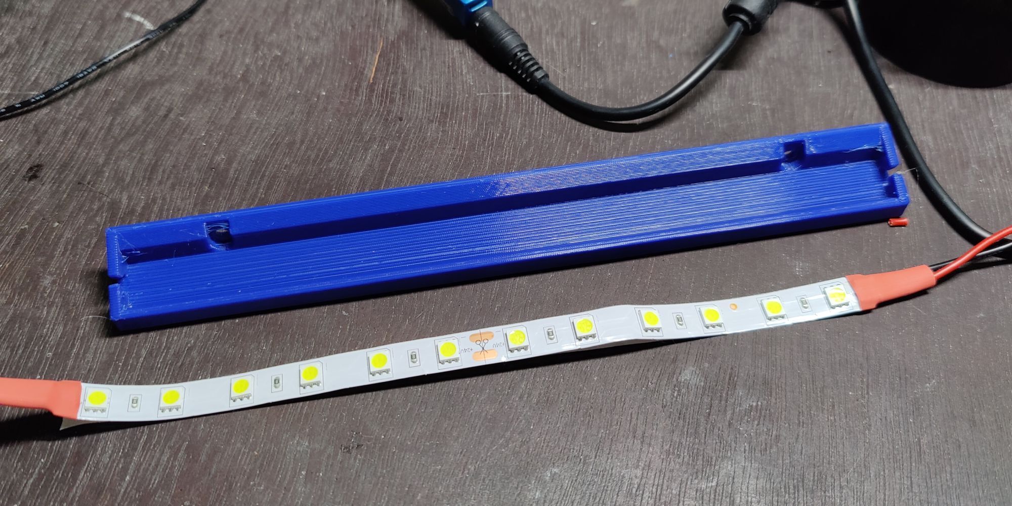 3D-printed LED strip holder.