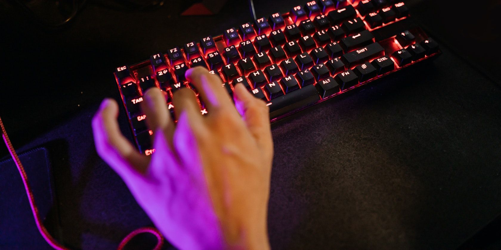 Closeup Photo of Person Typing on The Keyboard
