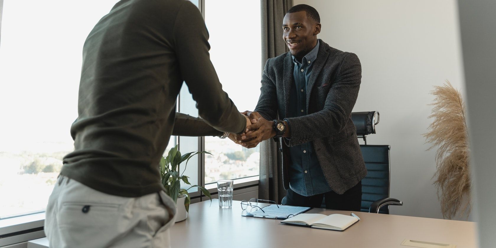 Man Shaking Hand With The Employer After Getting Job