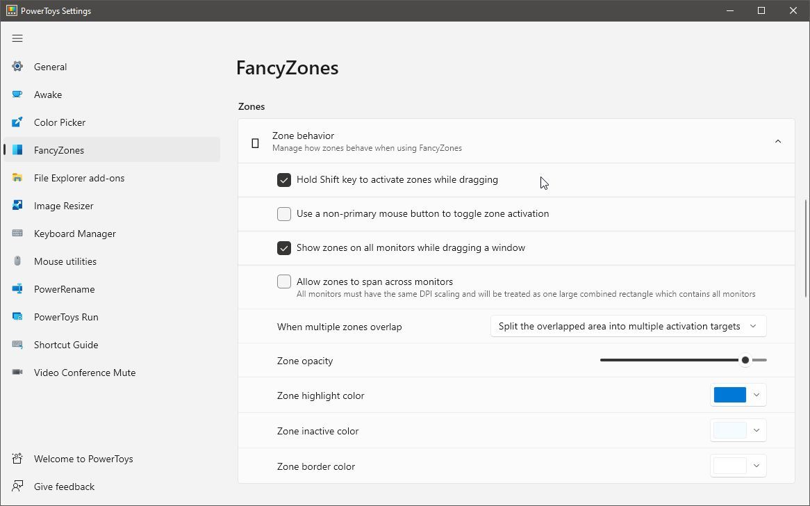 Configure PowerToys FancyZones zone behavior to better control when your windows will snap into position.