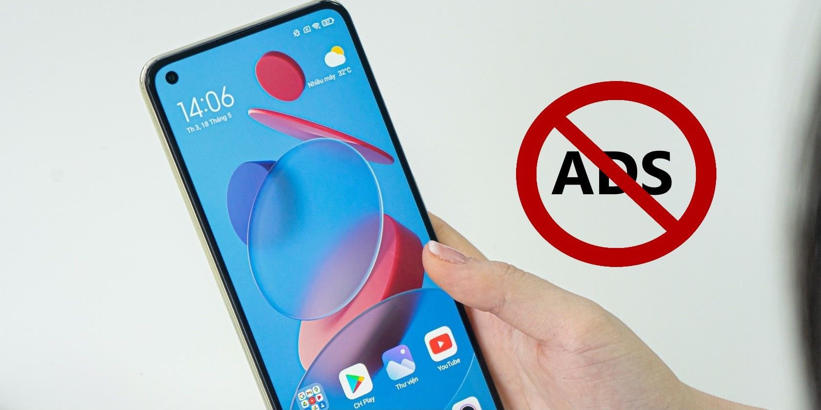 Person Holding a Xiaomi Phone next to a Blocked Ads Icon
