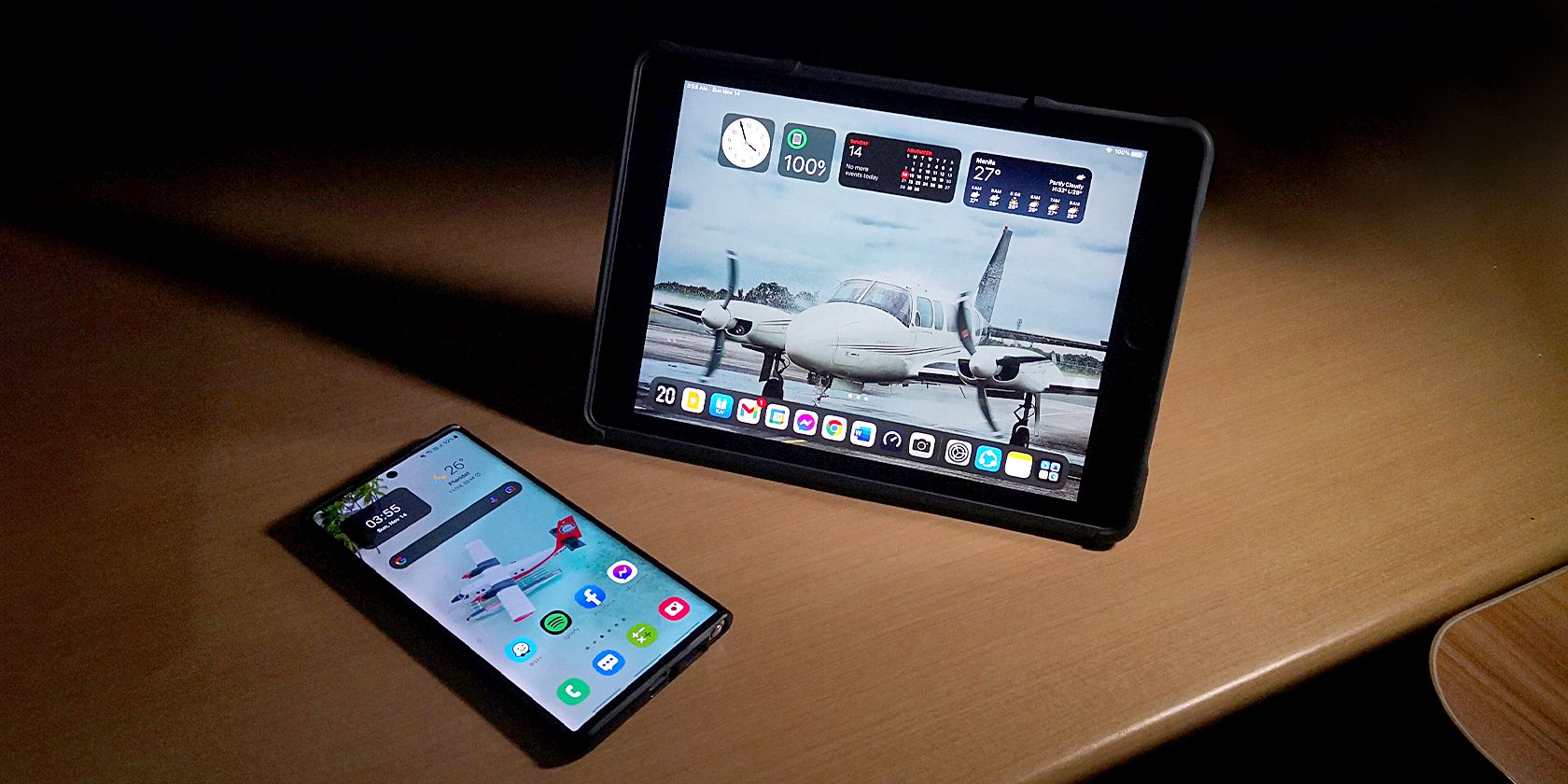A Samsung Galaxy Note10+ and and Apple iPad 6 on a desk