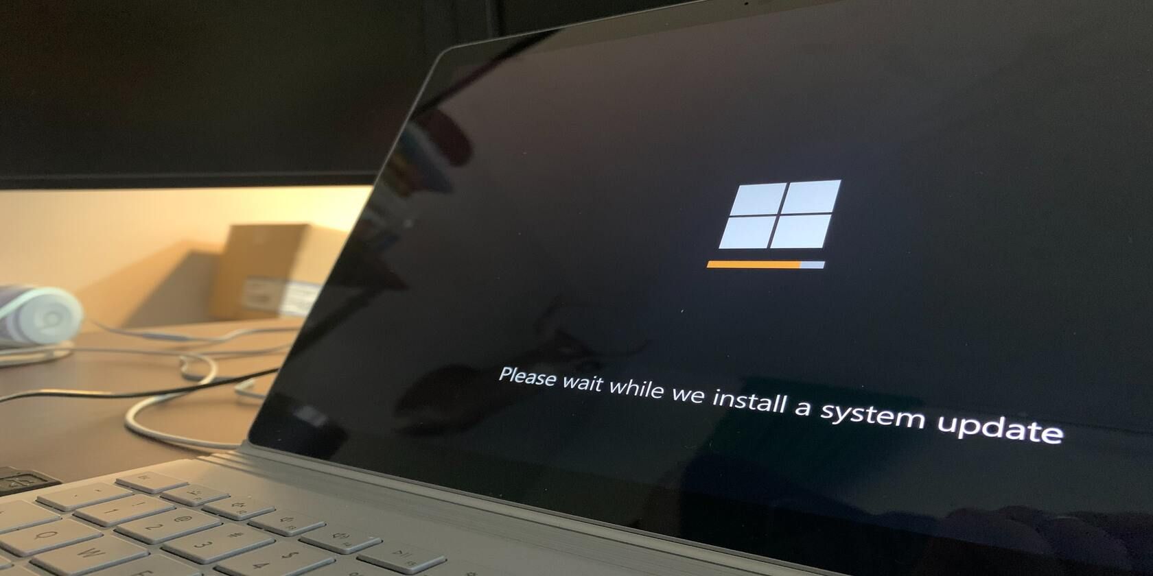 Windows laptop displaying a system update message