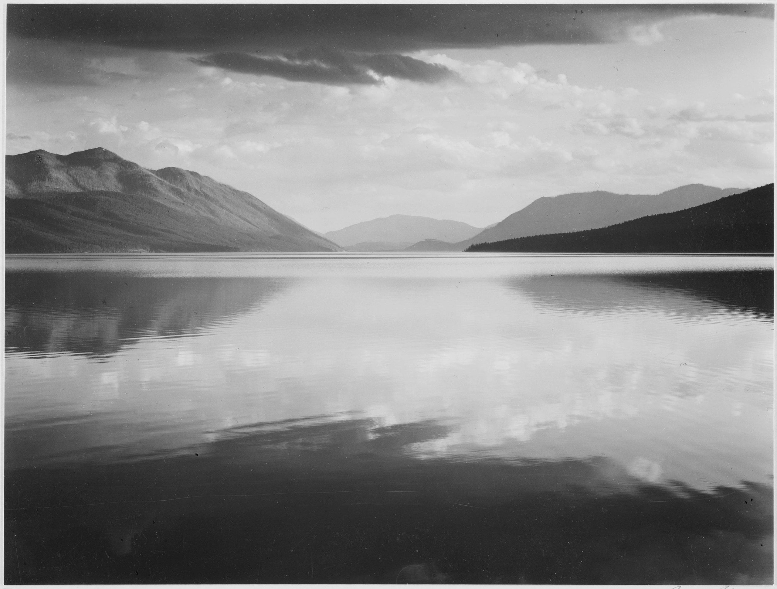 Ansel Adams landscape photo of water and mountains