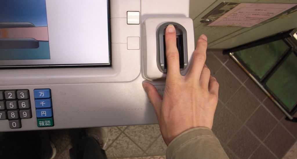 person using biometric security pad