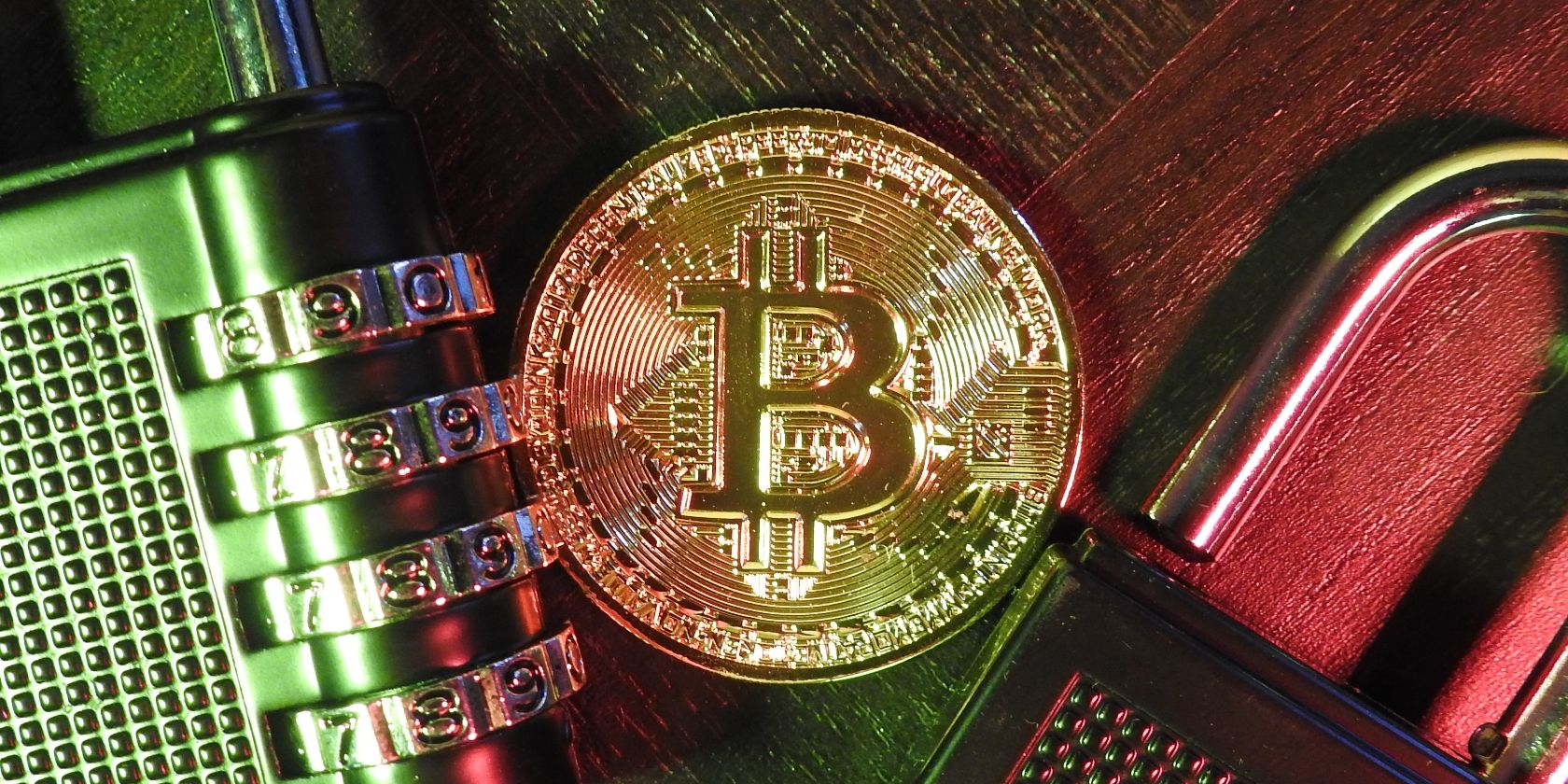 bitcoin next to padlocks