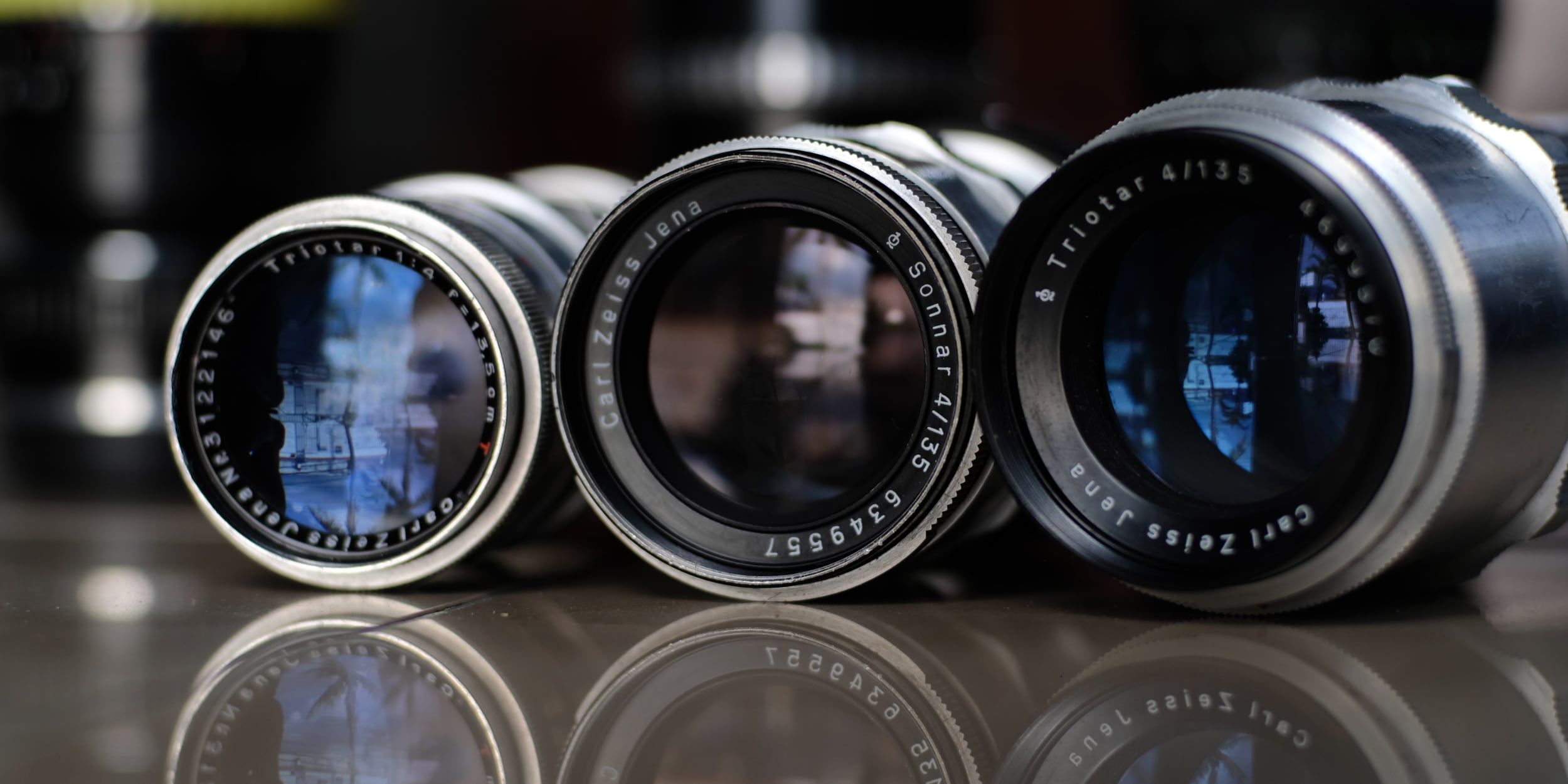 Photo of three camera lenses