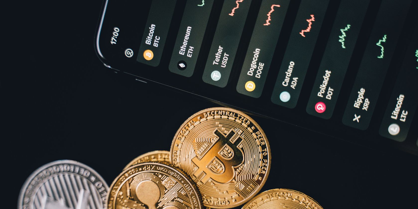 crypto coins next to exchange on phone