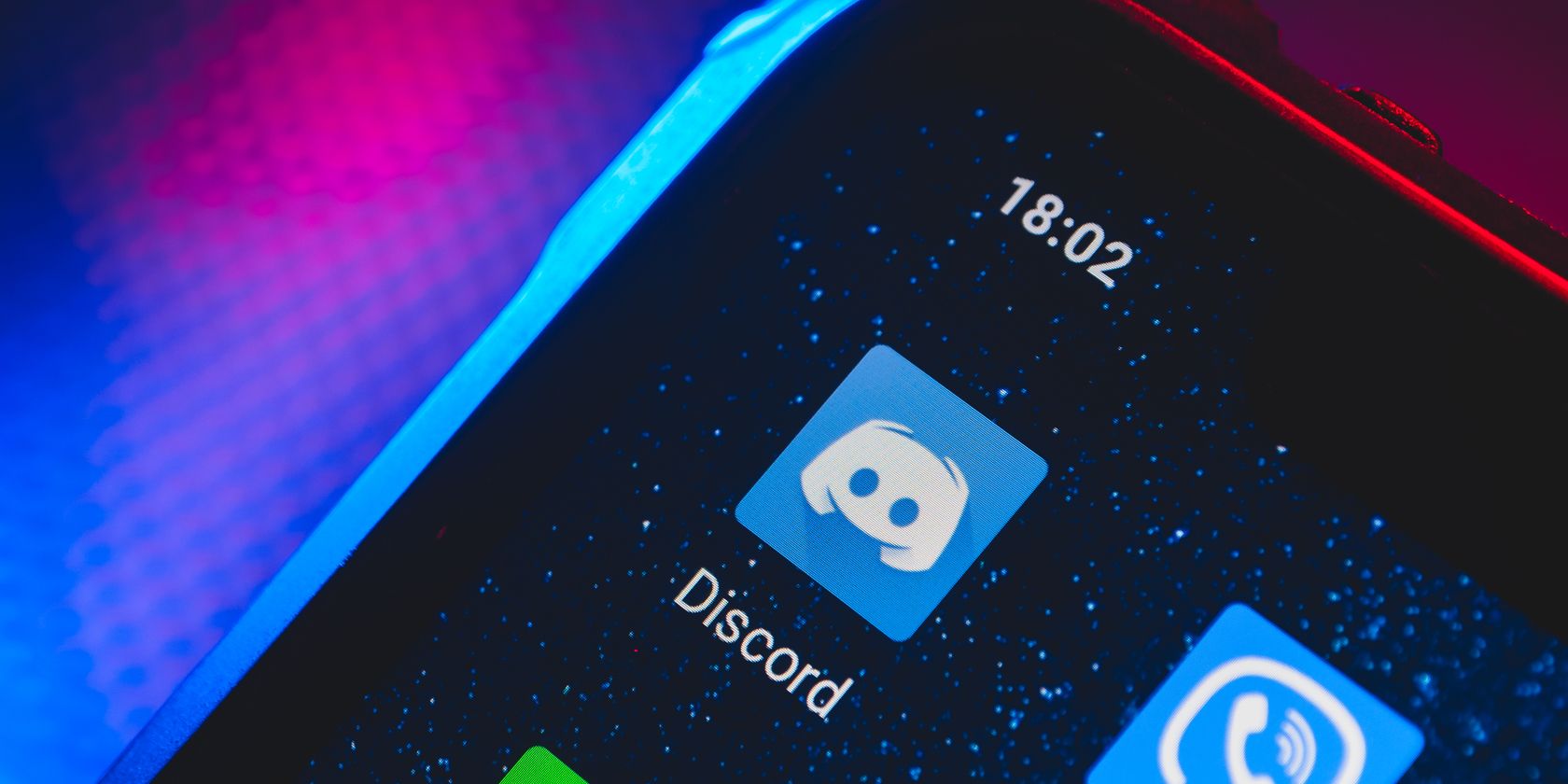 discord app logo on phone