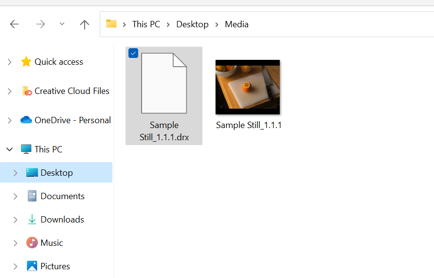 An exported PNG still and its sidecar DRX file.