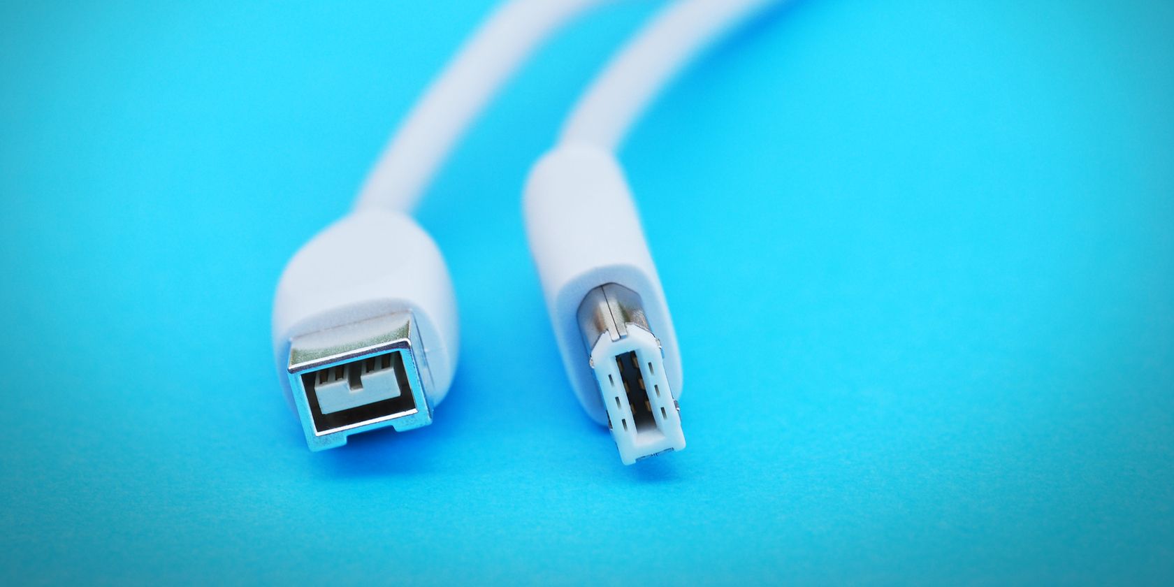 firewire cable on blue background feature image