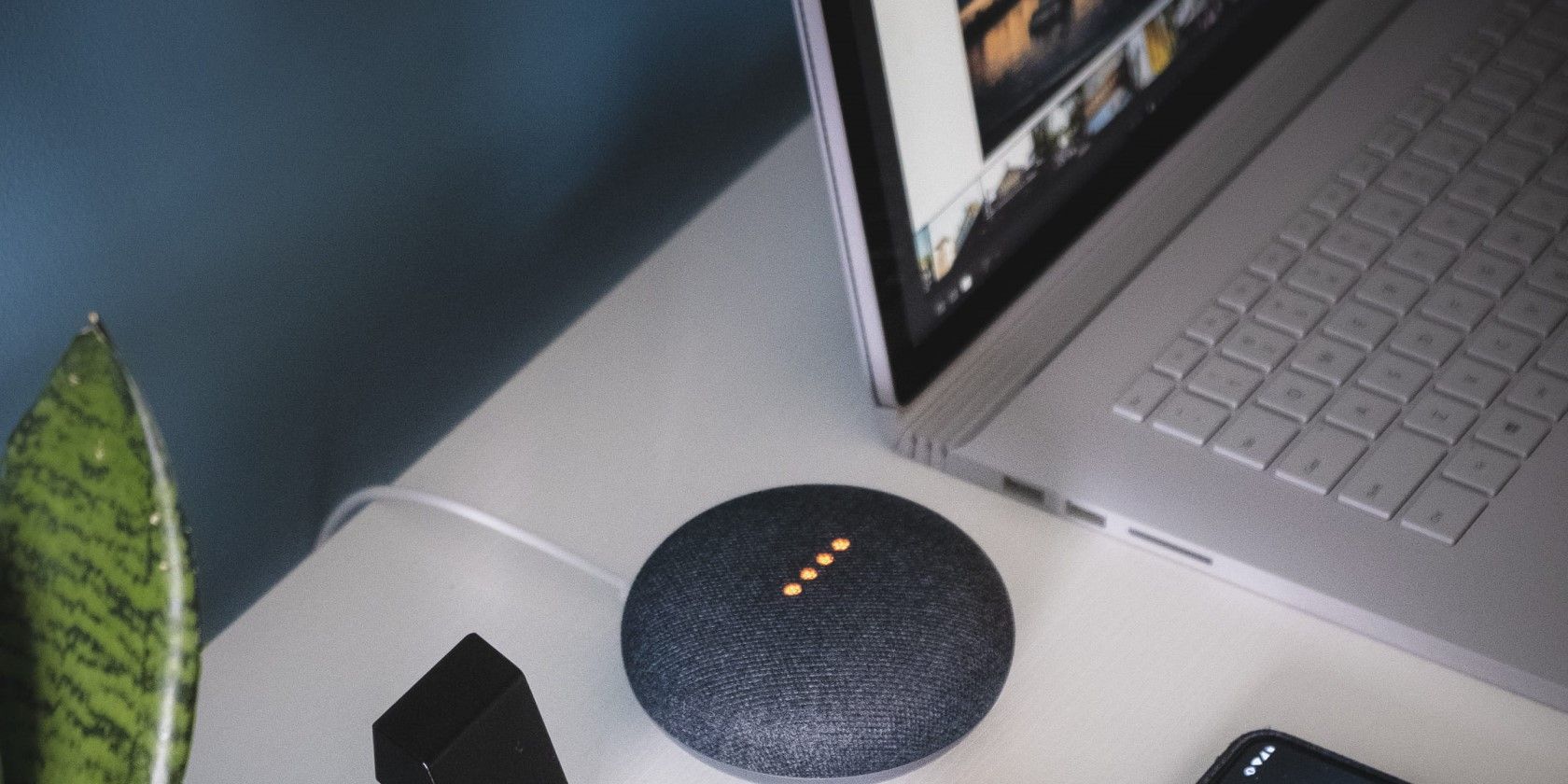 chalk google home in a desk with laptop