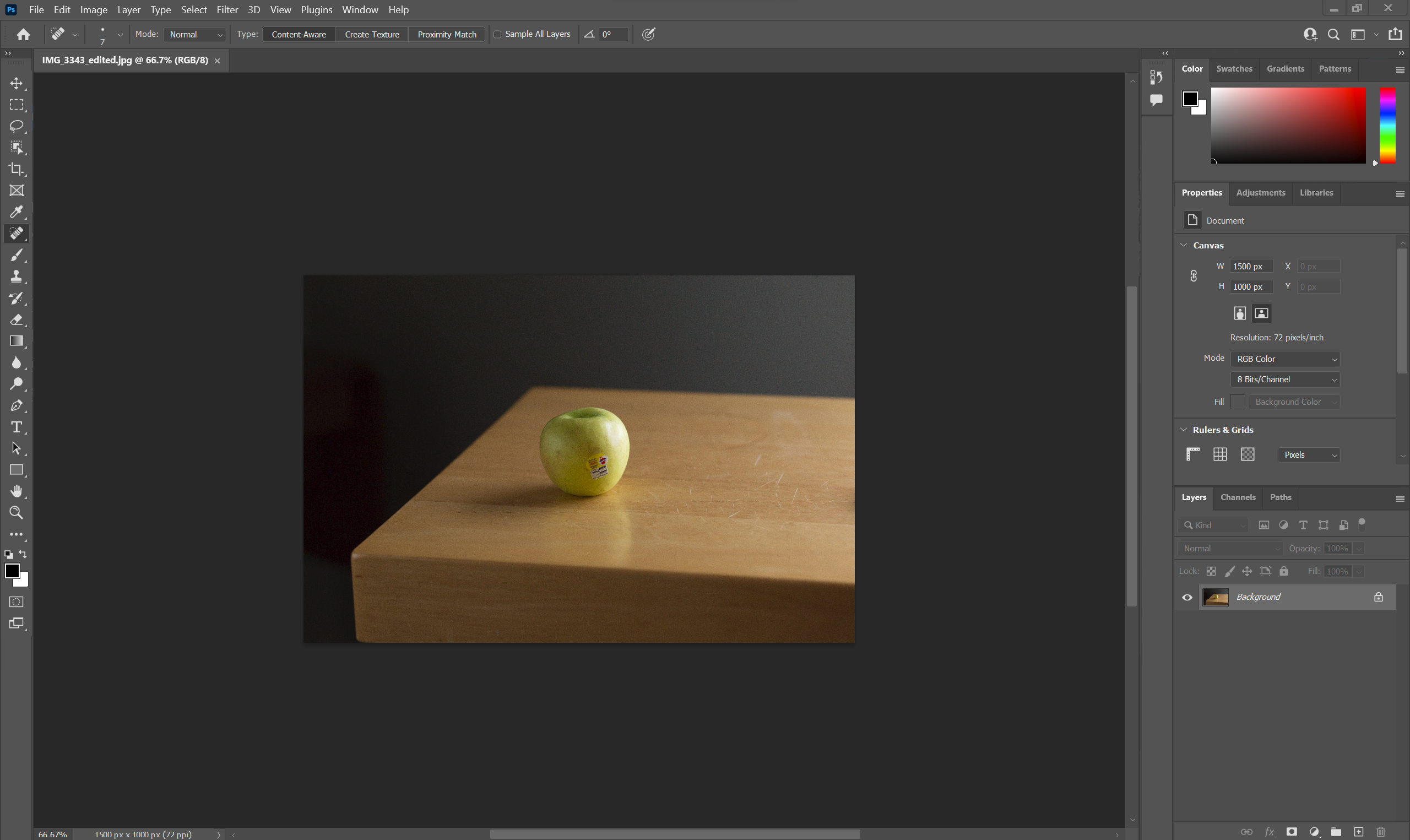 A picture of an apple, opened up in Photoshop.