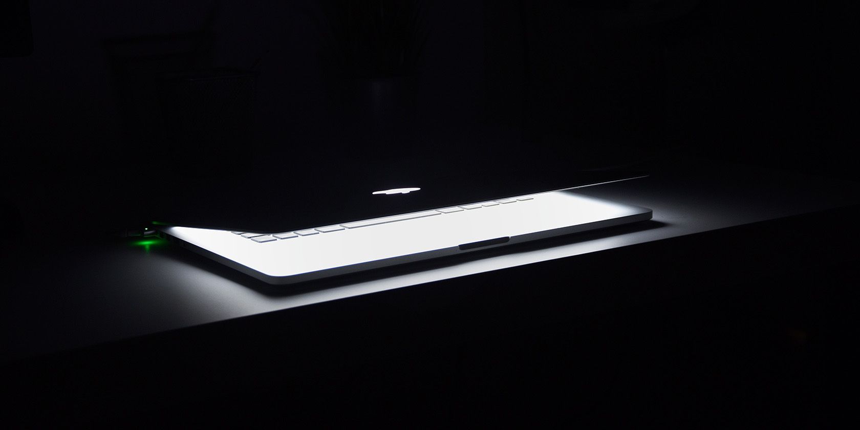 MacBook opening from sleep in a dark room