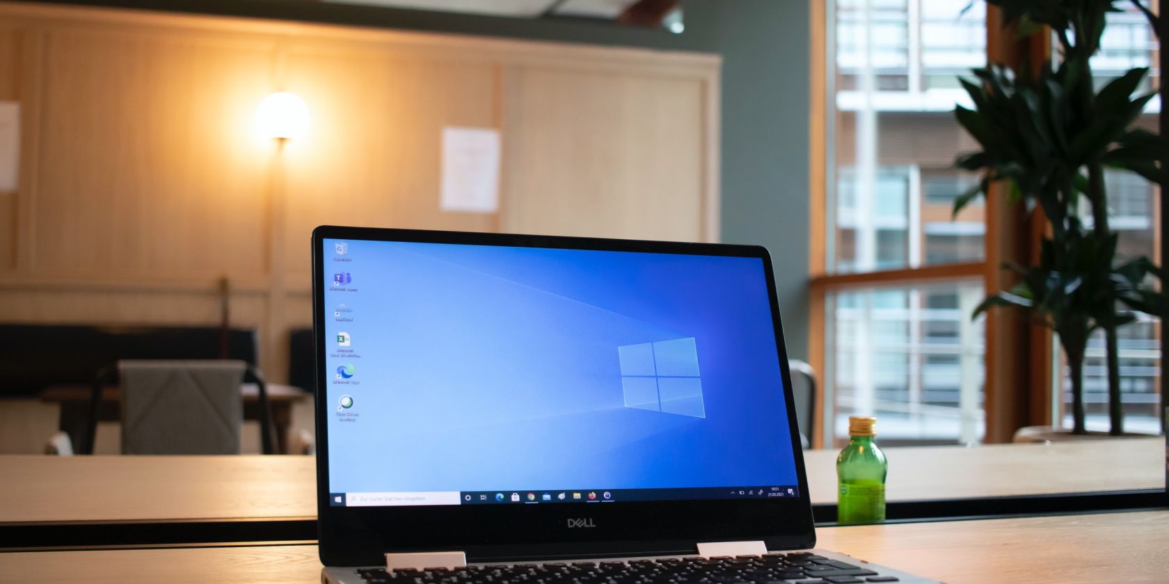 picture of a windows laptop sitting on a desk 