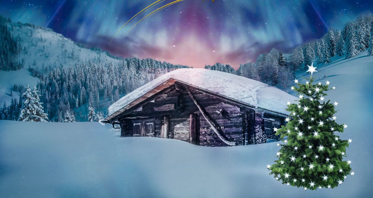 snow covered house with christmas tree outside