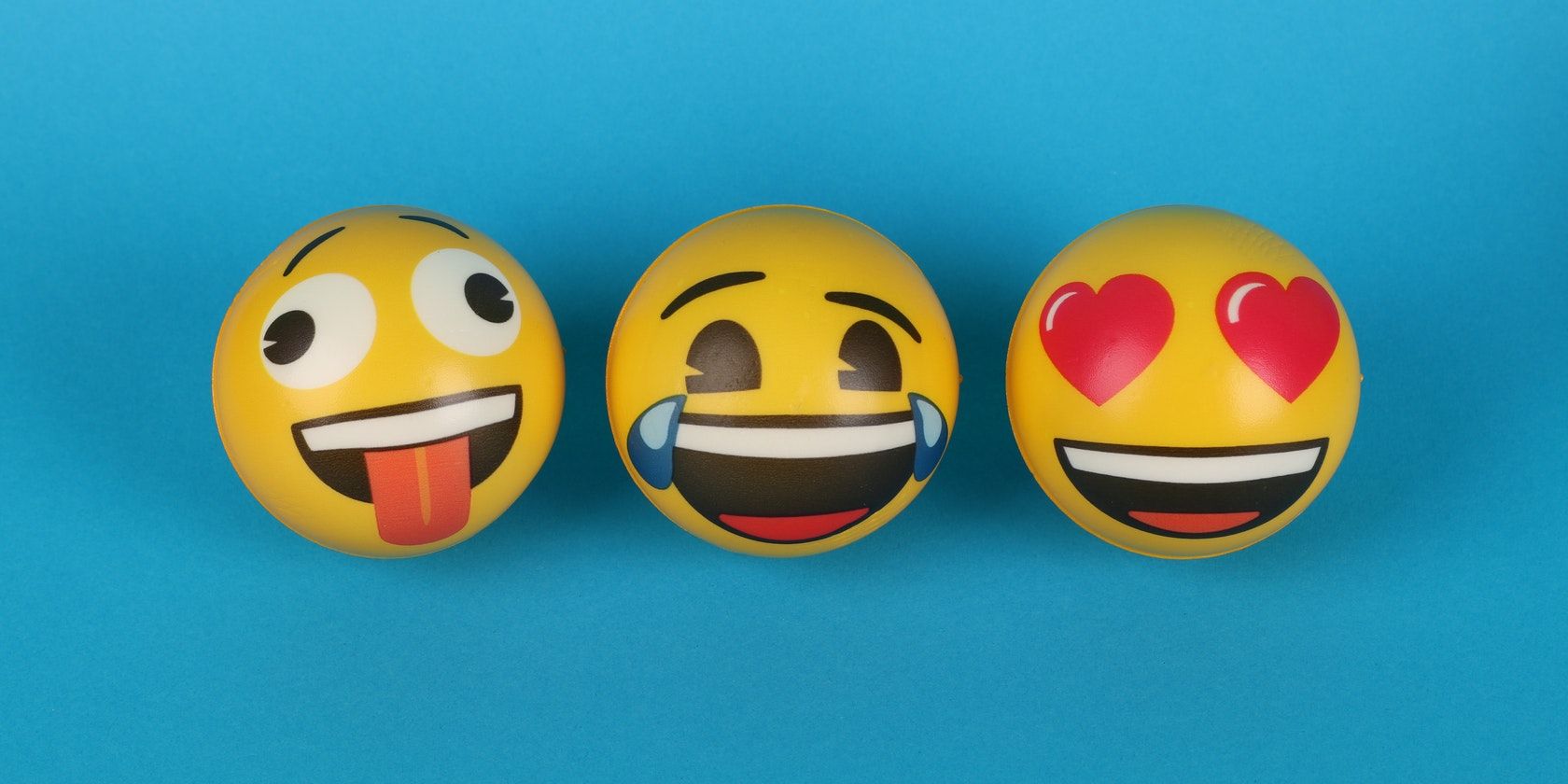 three emoji balls side by side