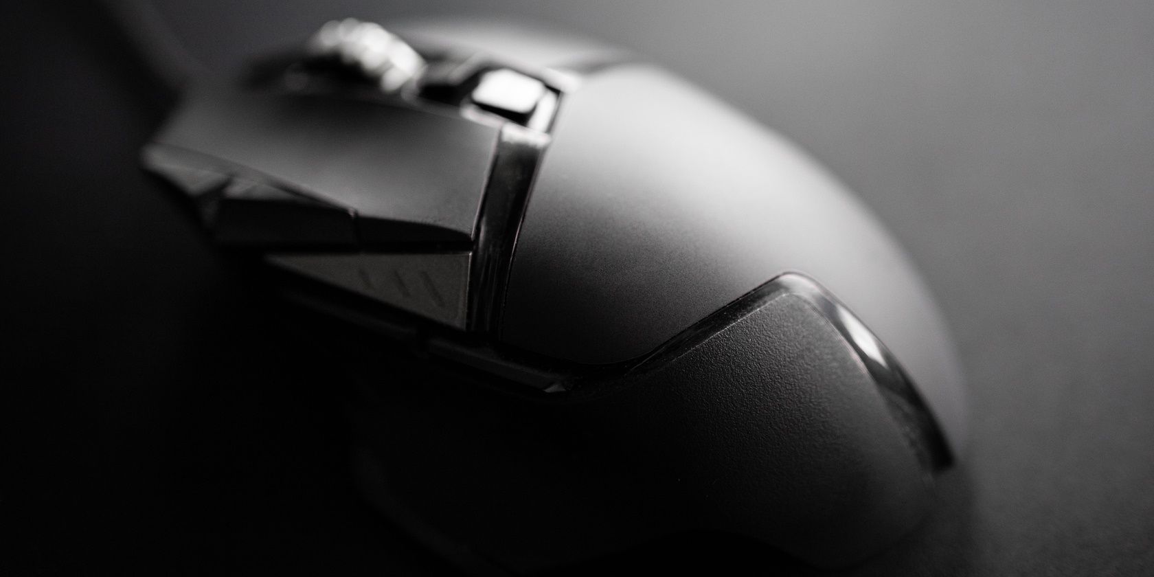 Black and white close-up of a gaming PC mouse