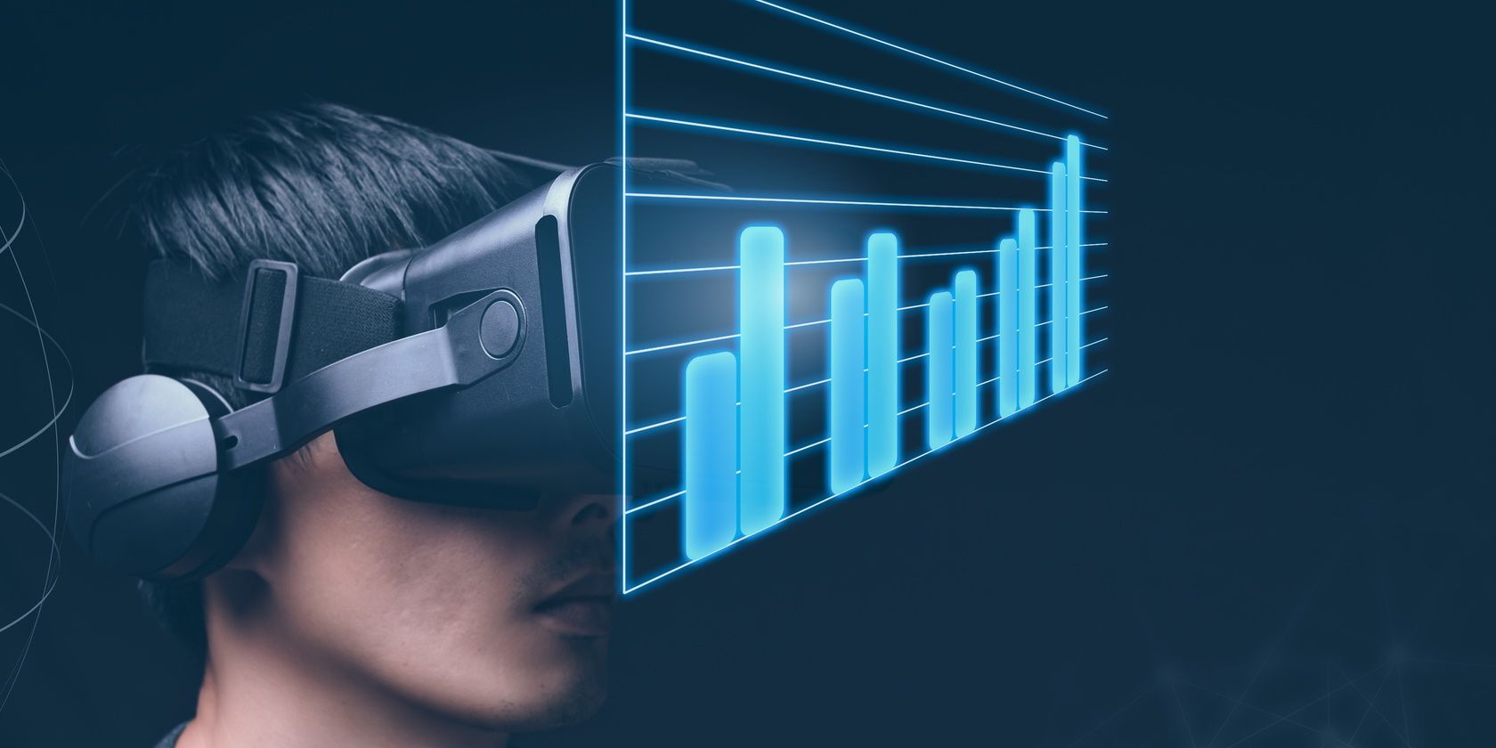 man viewing a graph while wearing virtual reality headset 