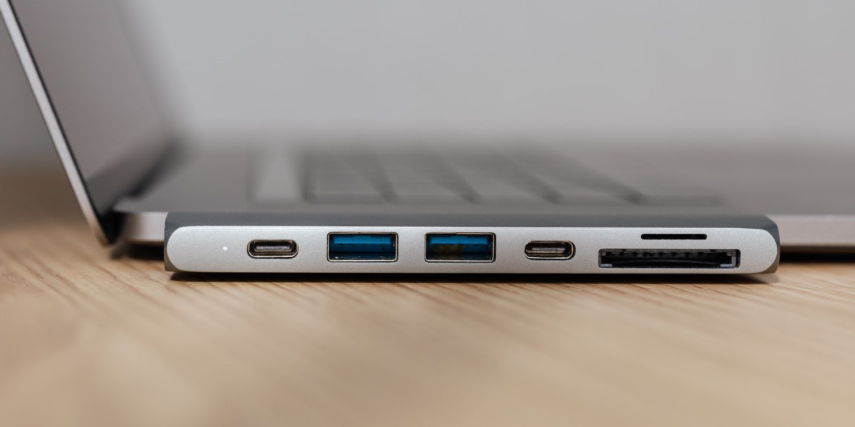 Close Up Image of Laptop Ports Placed on a Table