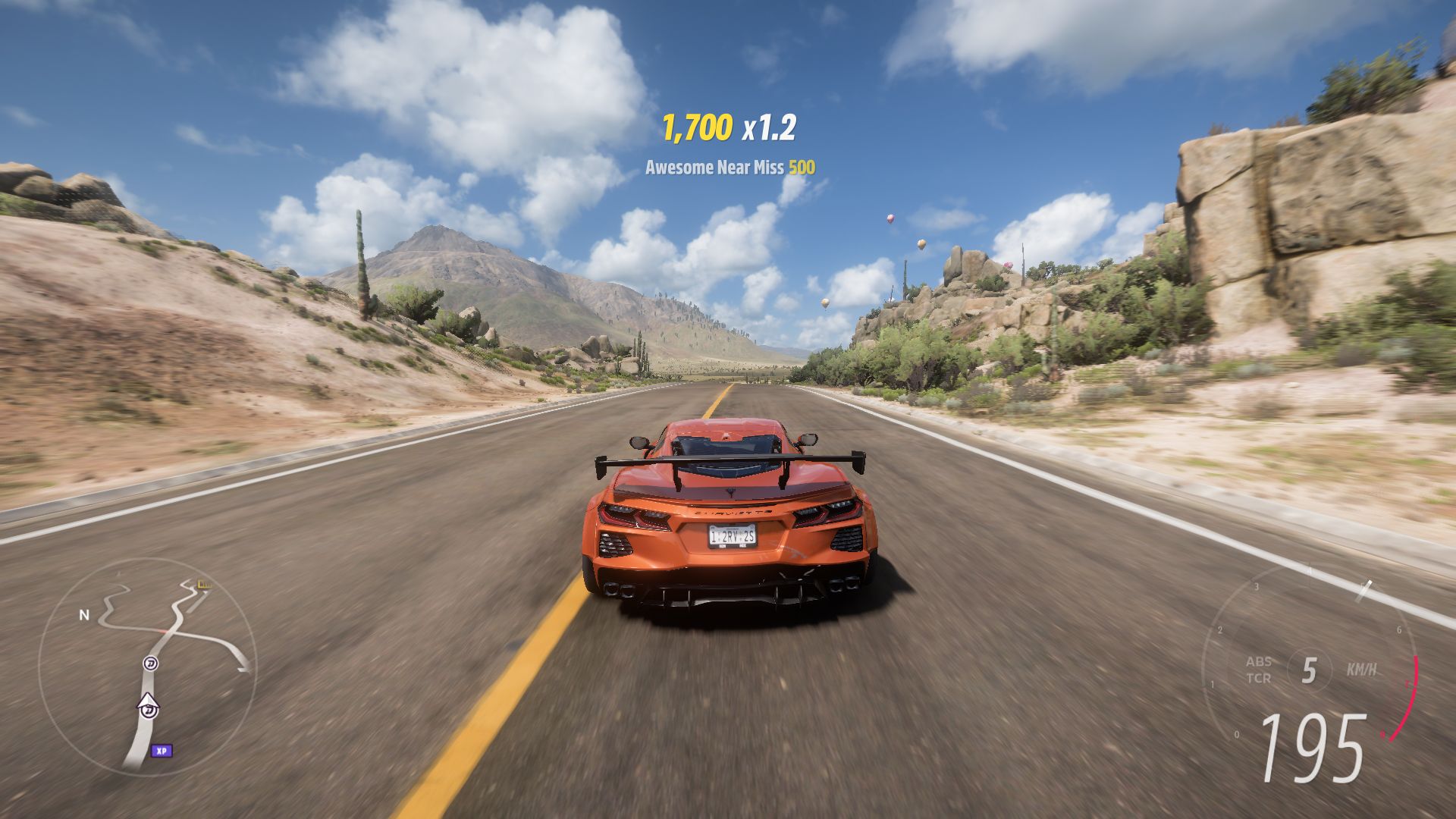 2020 Chevrolet Corvette C8 driving on a road in Forza Horizon 5